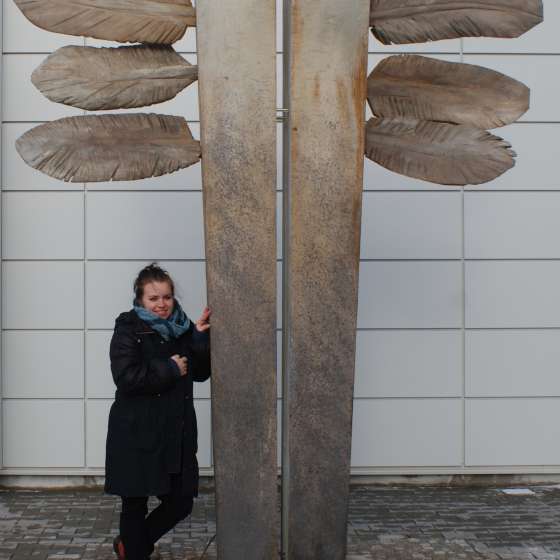 Adriana Majdzińska with his sculpture, ICARUS - wood, light, 2013, Kościerzyna, Poland